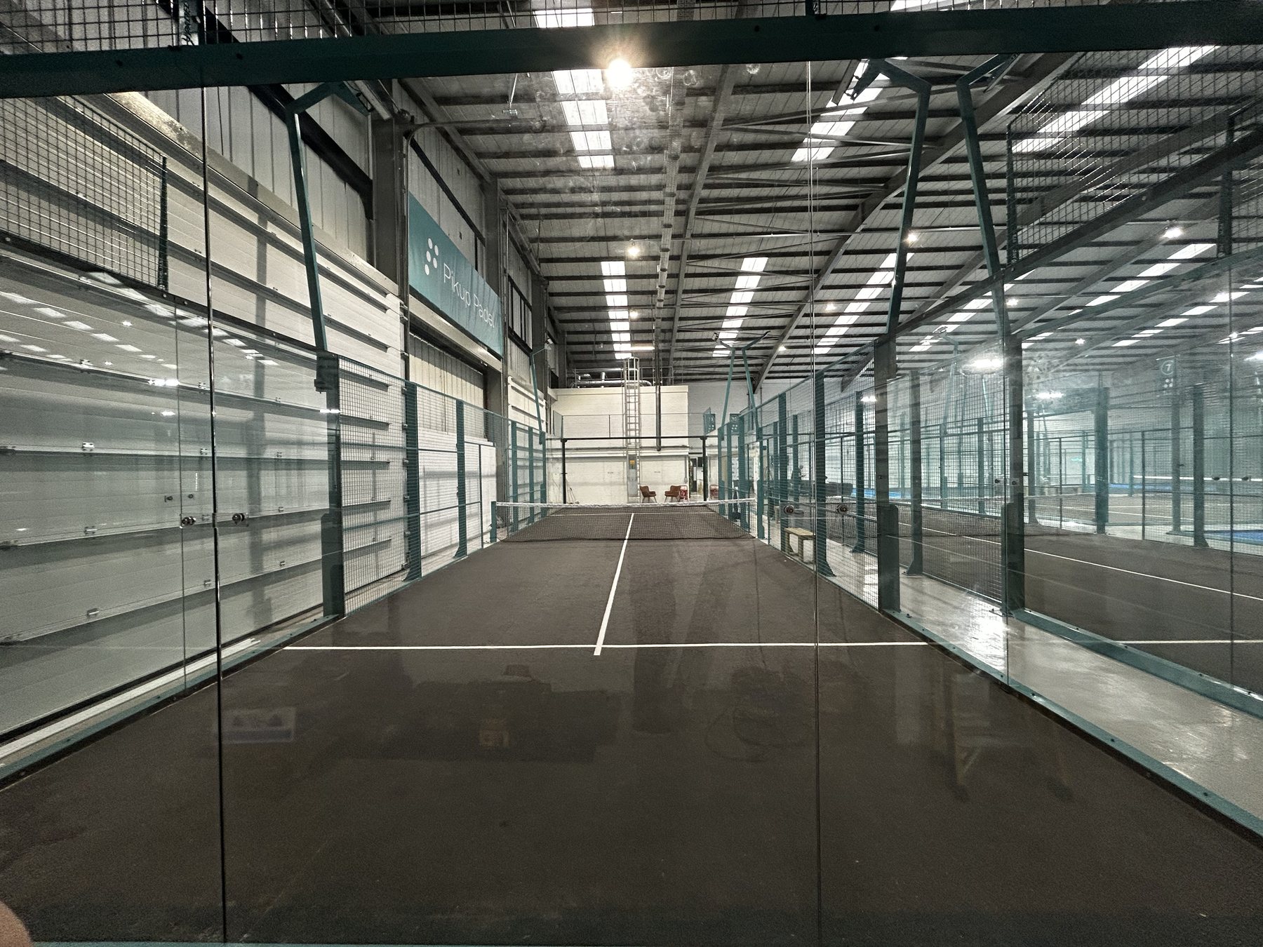 View down a padel court at Pikup Padel